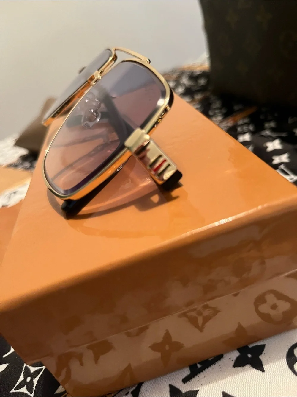 Gucci Gold Frame Sunglasses with Gradient Pink Lenses